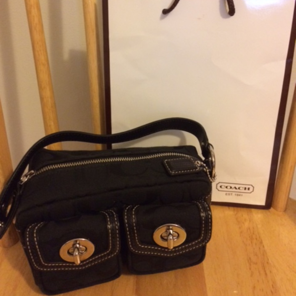 Small Black Signature “C” purse/cosmetic bag